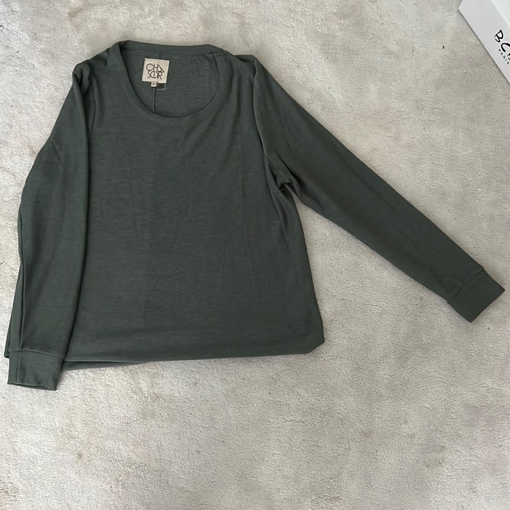 Green sweater. Fleece like fabric. Size XL